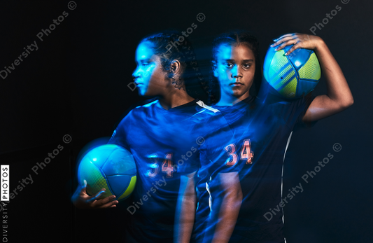 Young female soccer player in motion colorful portrait
