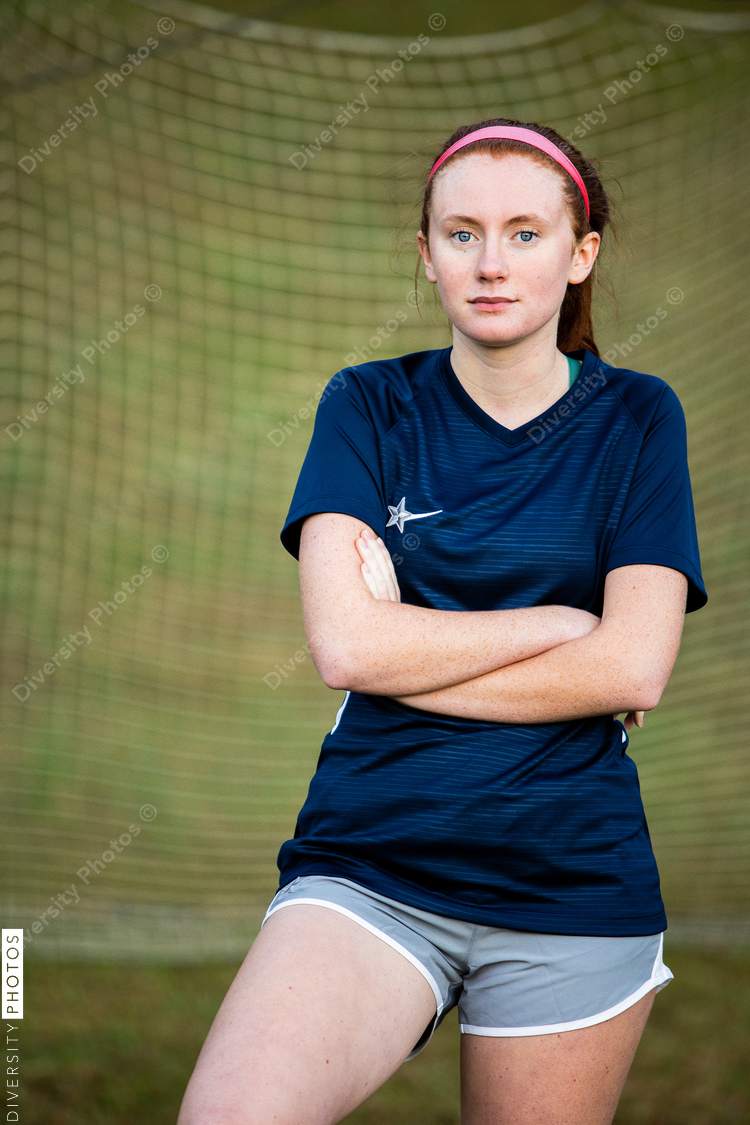 Teenage female soccer portrait on field