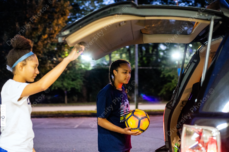 Girls packing up after the soccer game