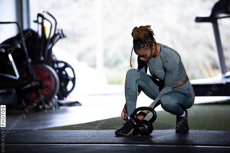 Fitness portrait of African American woman in gym