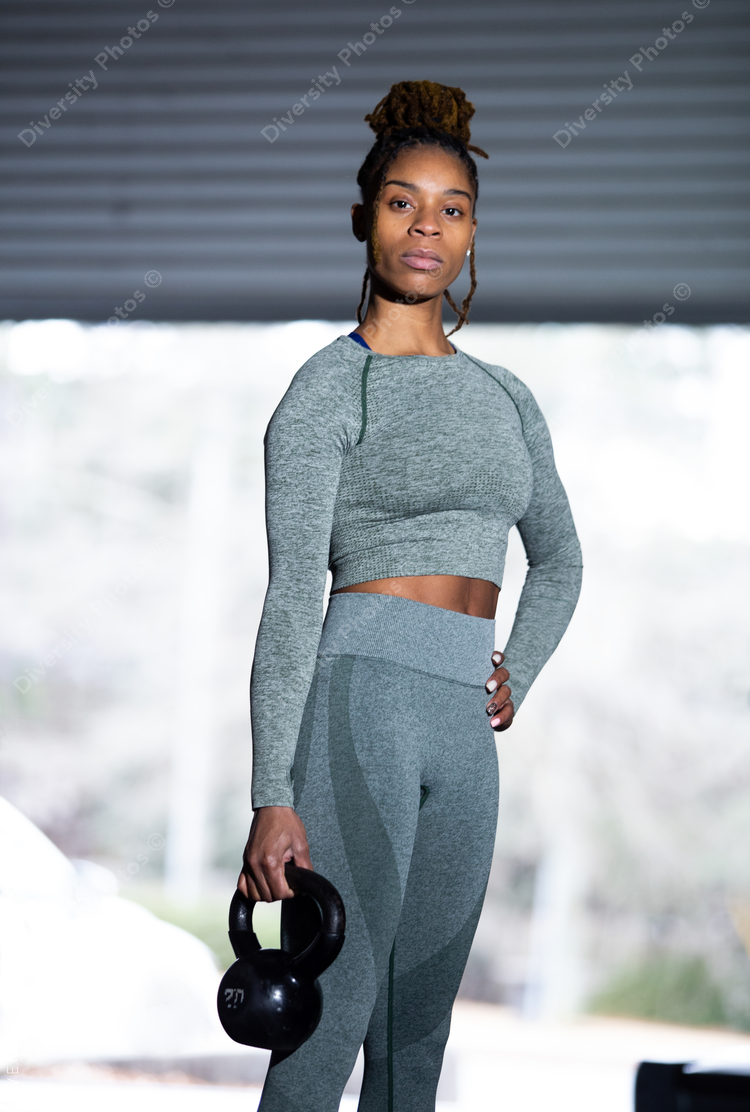 Portrait of Black fit woman in gym