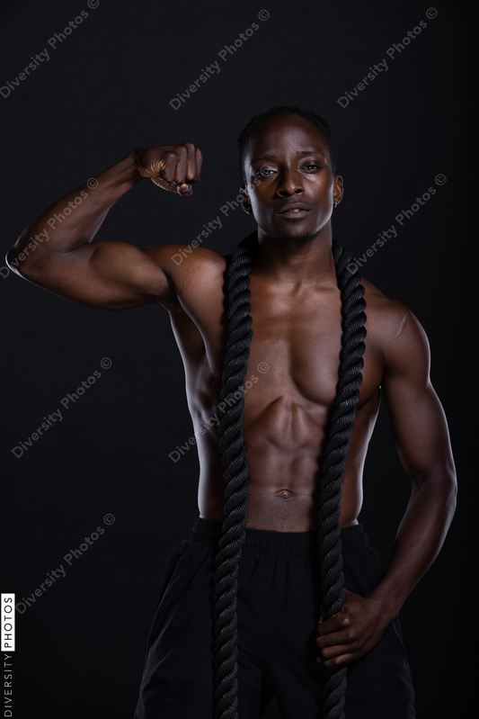 Black man studio portrait, fitness, strength, and power
