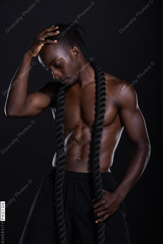 Black man studio portrait, fitness, strength, and power