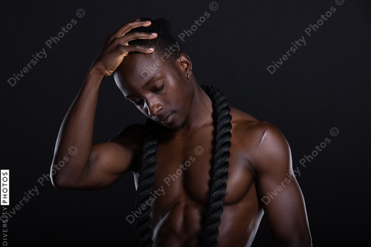 Black man studio portrait, fitness, strength, and power