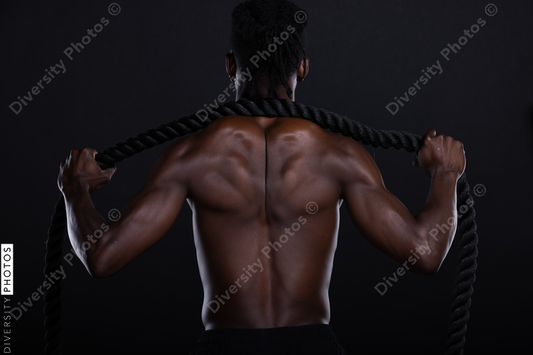 Black man studio portrait, fitness, strength, and power
