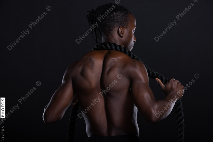 Black man studio portrait, fitness, strength, and power