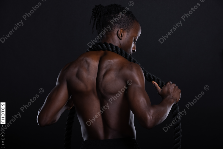 Black man studio portrait, fitness, strength, and power