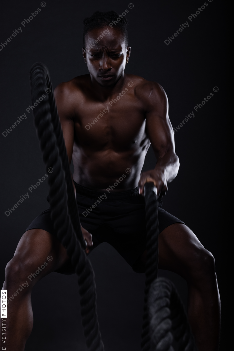 Black man doing intense sports training