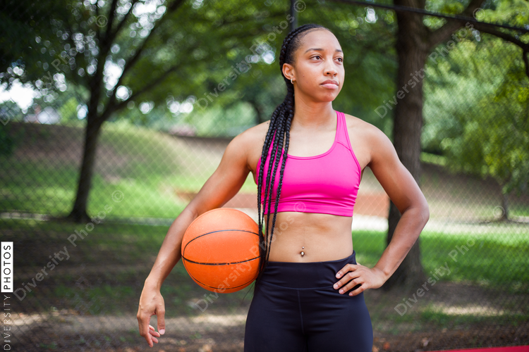 Woman gets ready to play basketball