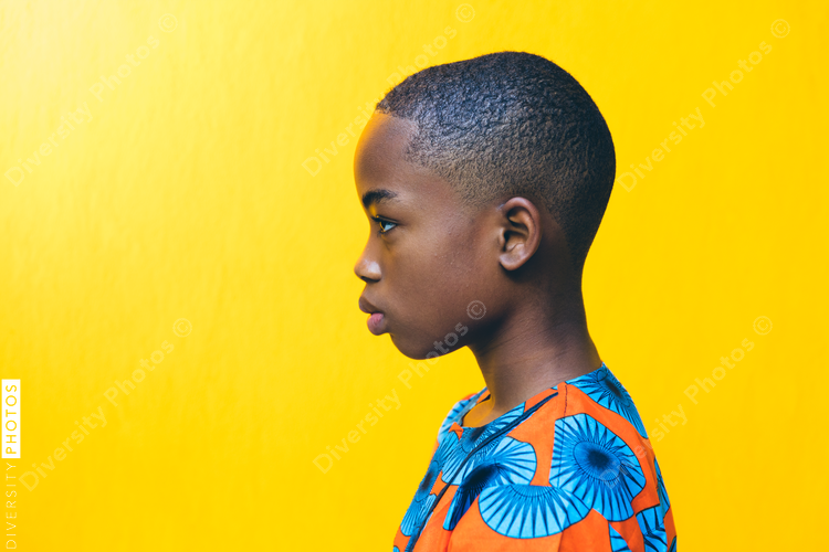 Studio portrait of boy wearing traditional African clothing