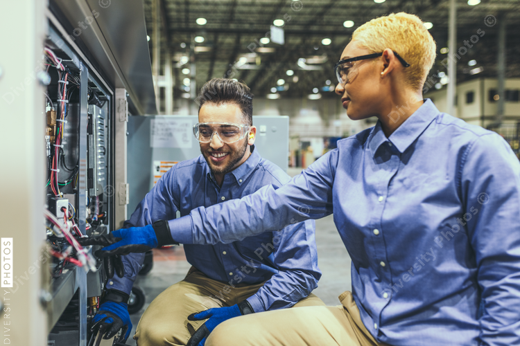 Service technicians inspecting equipment