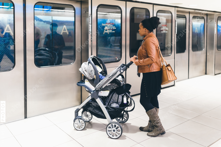 Woman travelling with her baby