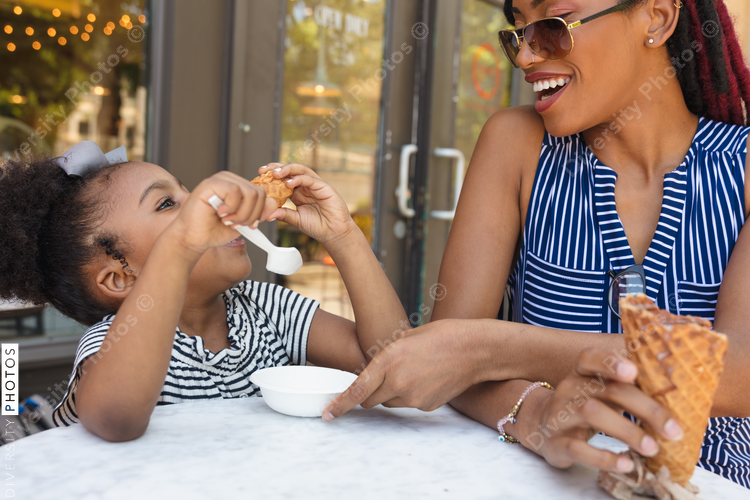 Mom and daughter eating ice cream