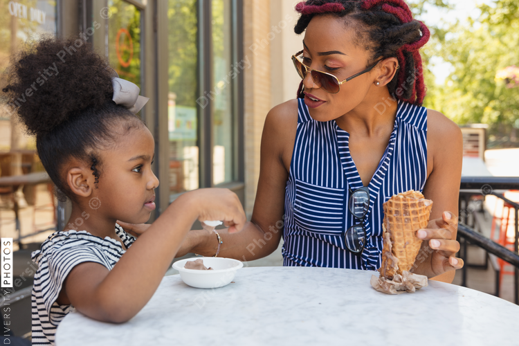 Mom and daughter eating ice cream