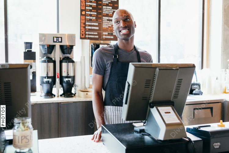 Man at the counter smiling