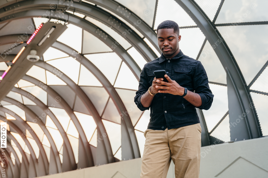 Young man using his mobile phone