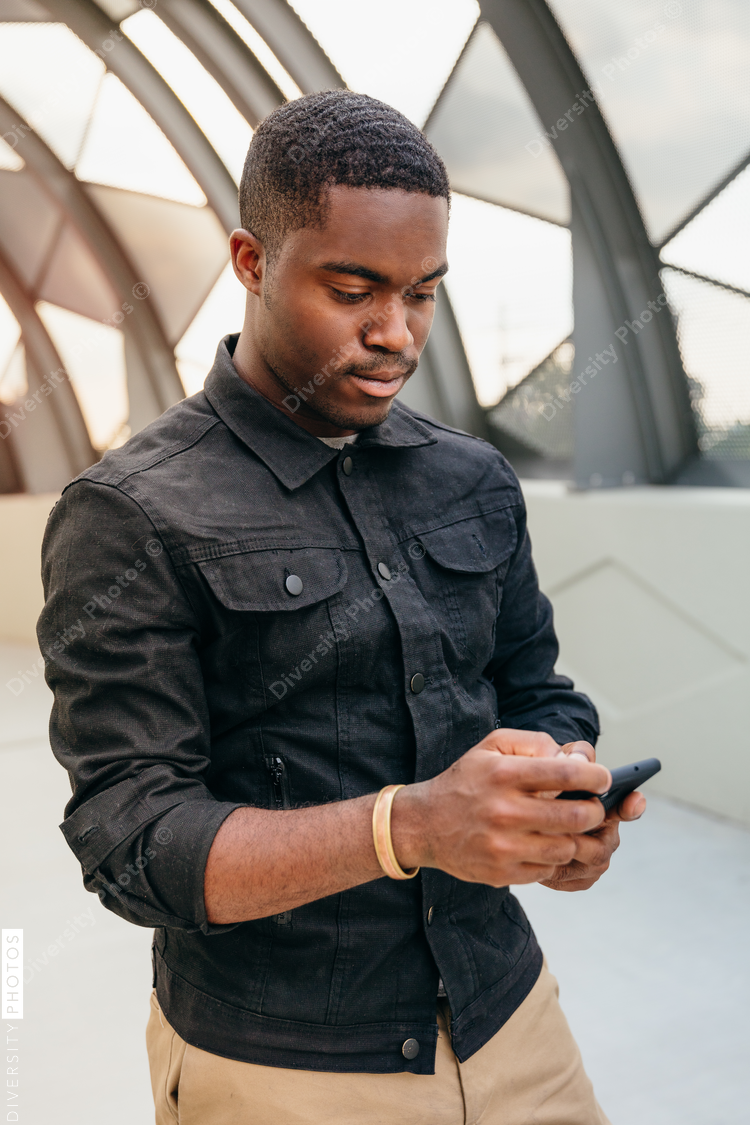Close up view of man using mobile phone