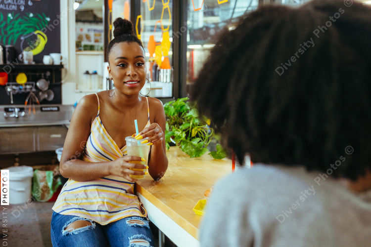 Woman smiling while having conversation