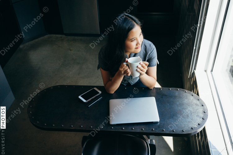 Woman looking out of the window