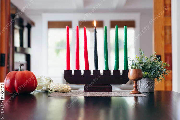 Selective focus of Kwanzaa candles on table setting