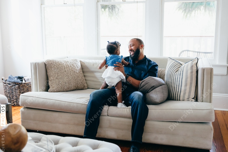 Father and daughter playing together