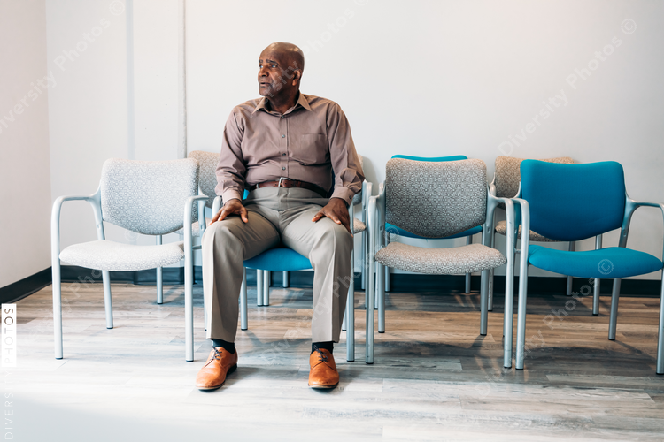 Mature man waiting in medical office