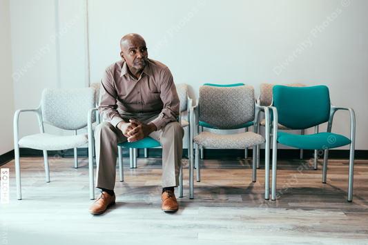 Mature man waiting in medical office