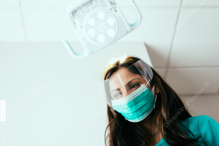 Low angle view of nurse wearing face mask
