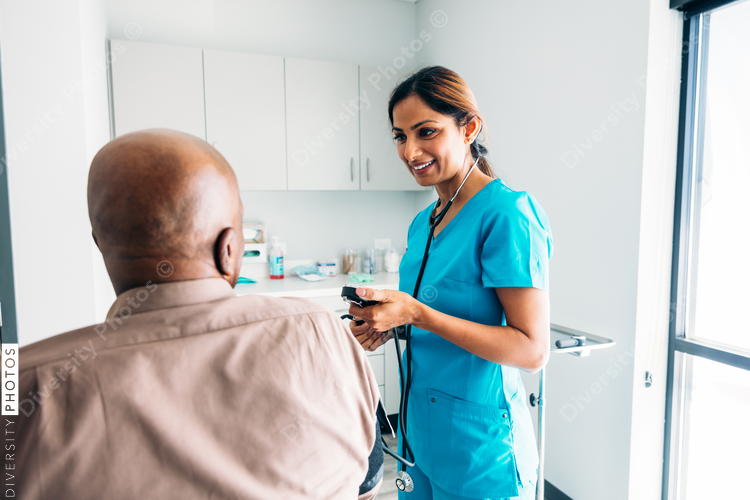 Nurse smiling at patient