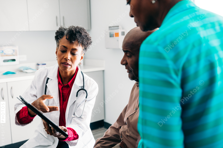 Doctor consulting mature patient