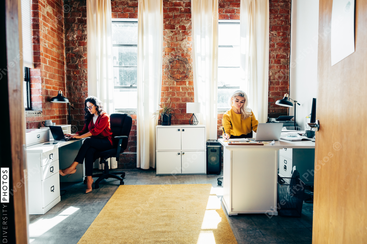Coworkers working in modern office