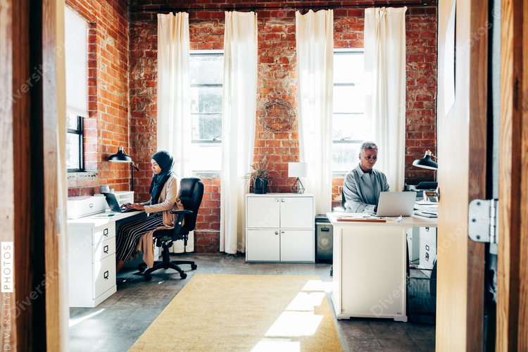 Coworkers working in modern office