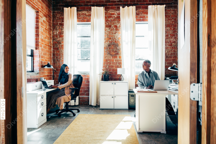Coworkers working in modern office