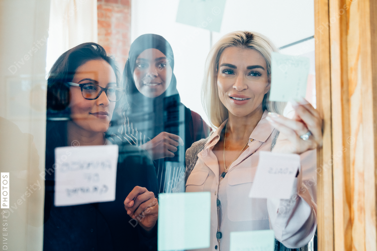 Diverse team brainstorming in meeting