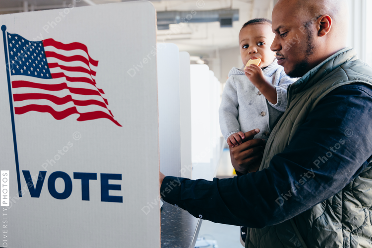 Father and son voting on election day