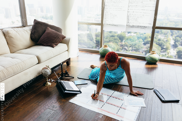 Black woman having virtual brainstorm meeting at home during pandemic