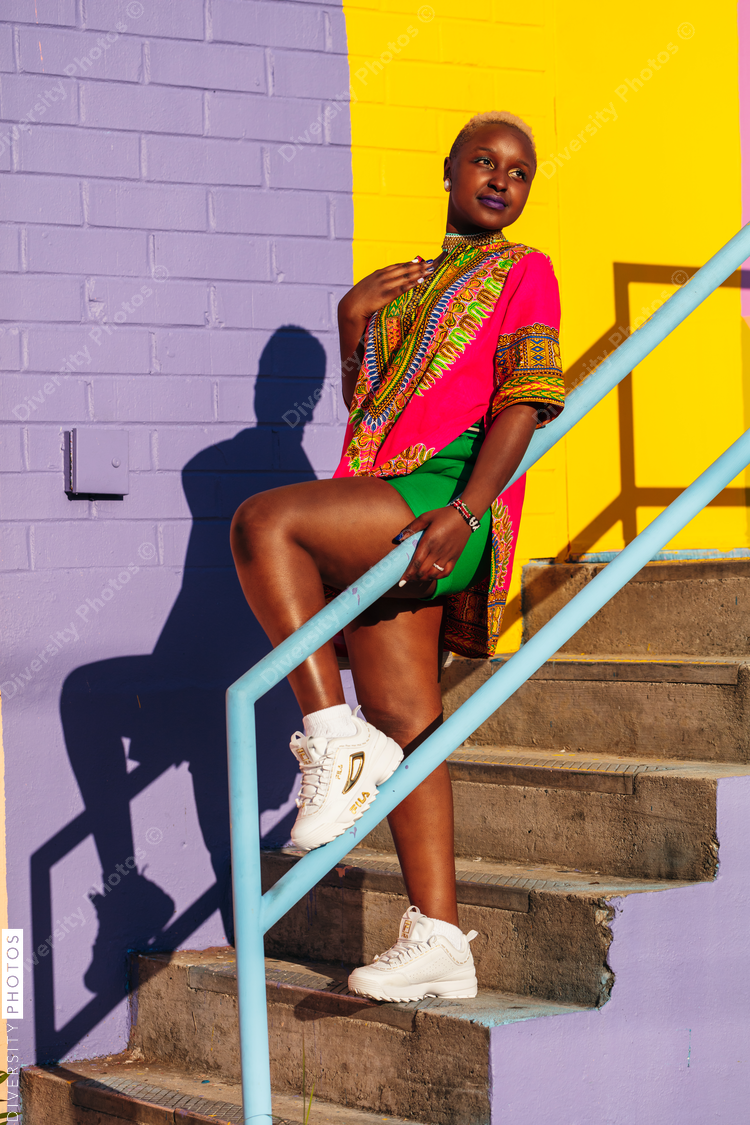 Confident woman enjoying sunny day in the city