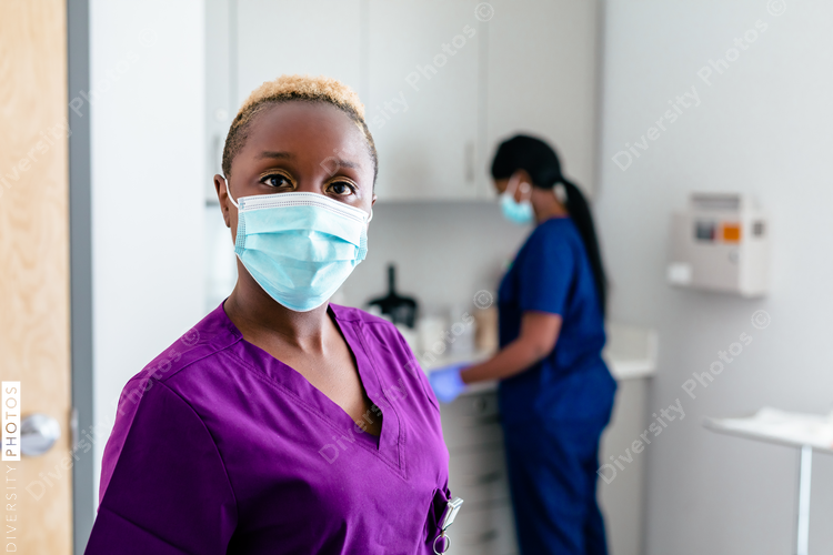 Portrait of Black female nurse with scrubs and stethoscope