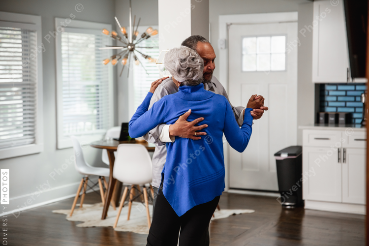 Active lifestyle, senior couple dances at home