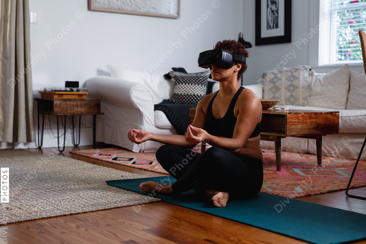Black woman does meditation virtual reality exercise