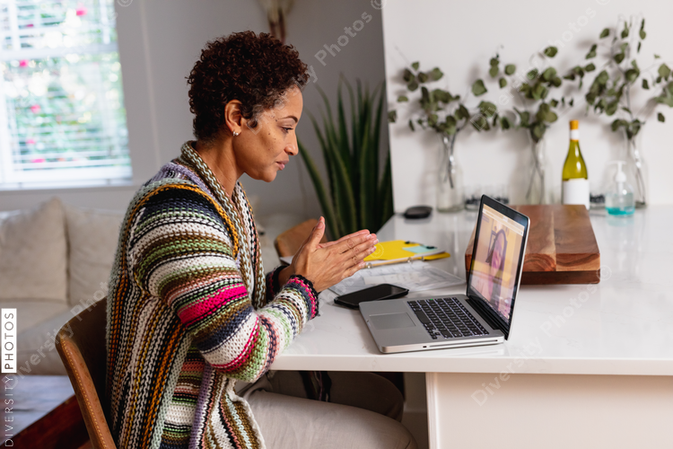 Image consultant having video chat with work team