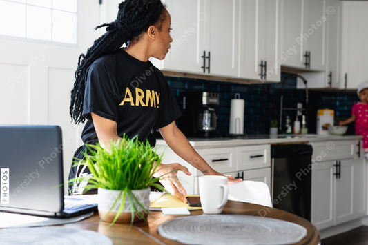 Army woman at home with family