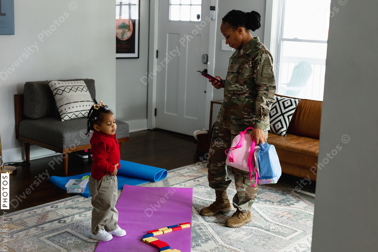 Military mother and daughter preparing to go back to school