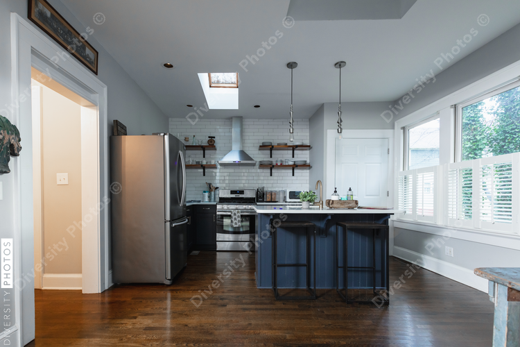 Middle class home, kitchen interior, authentic house, wide angle