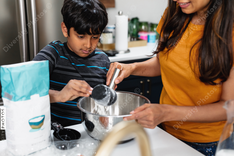 Mom and son baking in the kitchen
