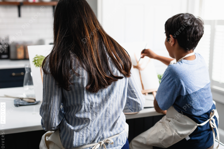 Indian mother and son painting at home, DIY art activity