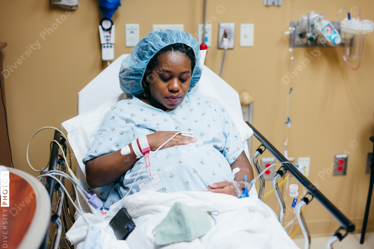 Woman in hospital before giving birth, pregnant 