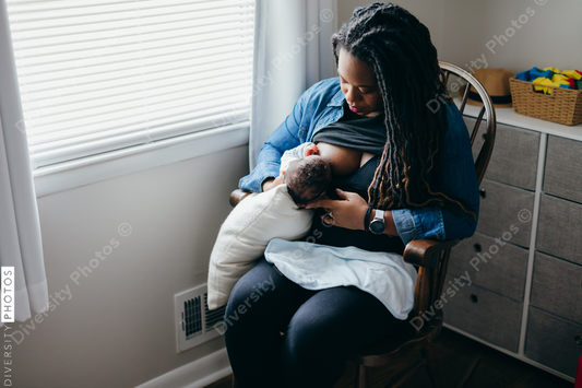 African American mother breastfeeding baby