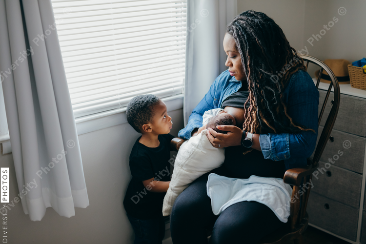 African American mother breastfeeding baby