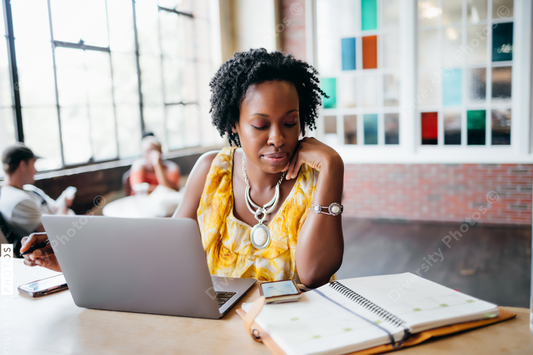 African American woman working at a local cafe